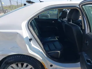 2012 Ford Fusion Hybrid with VIN 3FADP0L38CR255511, listed as a IAAI auction lot 42381063 with 82,083 mi miles and . Bid and sale history available at DreamBid. Image 8.