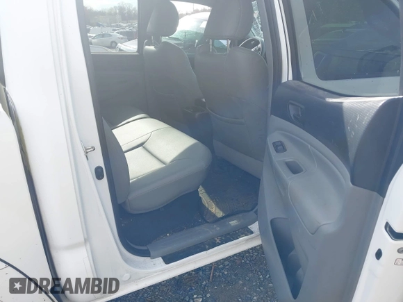 2015 Toyota Tacoma with VIN 3TMLU4EN5FM188601, listed as a IAAI auction lot 41883555 with 143,904 mi miles and . Bid and sale history available at DreamBid. Image 8.