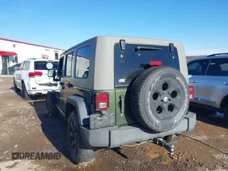2008 Jeep Wrangler Unlimited X with VIN 1J8GA39118L594626, listed as a IAAI auction lot 41618878 with 166,071 mi miles and . Bid and sale history available at DreamBid. Image 3.