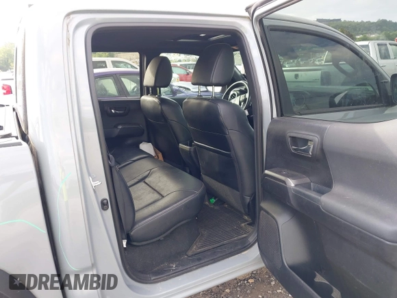 2021 Toyota Tacoma SR with VIN 5TFCZ5AN7MX255512, listed as a IAAI auction lot 42497907 with 50,563 mi miles and . Bid and sale history available at DreamBid. Image 8.