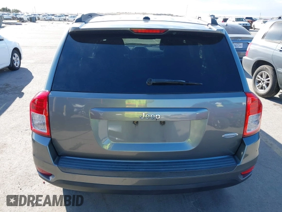 2011 Jeep Compass with VIN 1J4NT1FA0BD246586, listed as a IAAI auction lot 41253630 with 120,540 mi miles. Bid and sale history available at carsss.com. Image 16.