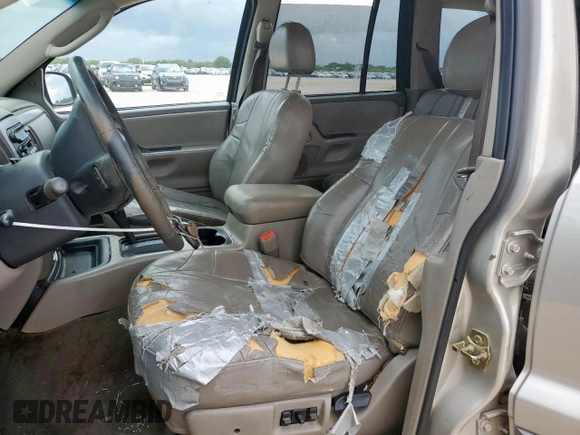 2003 Jeep Grand Cherokee Laredo with VIN 1J4GX48S13C609036, listed as a Copart auction lot 63143505 with 127,188 mi miles and Clean title. Bid and sale history available at DreamBid. Image 7.