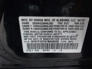 2007 Honda Pilot EX-L with VIN 5FNYF28767B040528, listed as a IAAI auction lot 41155102 with 152,356 mi miles. Bid and sale history available at carsss.com. Image 9.