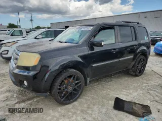 2010 Honda Pilot Touring z VIN 5FNYF3H95AB020303, wystawiony jako Copart lot #63252465 z przebiegiem 236 386 mil mil oraz Czysty tytuł • Clean title. Historia ofert i sprzedaży dostępna na DreamBid. Obrazek 1.