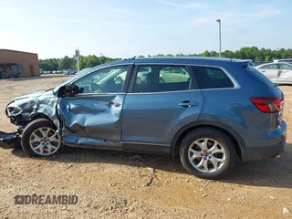 2014 Mazda CX-9 Touring with VIN JM3TB3CV7E0435659, listed as a IAAI auction lot 42428247 with 124,523 mi miles and . Bid and sale history available at DreamBid. Image 14.