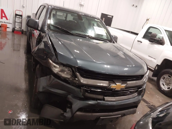 2020 Chevrolet Colorado 4WD Z71 with VIN 1GCGTDEN1L1163546, listed as a IAAI auction lot 41706719 with 64,662 mi miles and . Bid and sale history available at DreamBid. Image 12.
