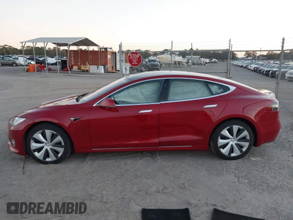 2020 Tesla Model S Long Range with VIN 5YJSA1E26LF390856, listed as a IAAI auction lot 41013728 with 54,985 mi miles. Bid and sale history available at carsss.com. Image 13.