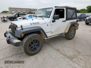2016 Jeep Wrangler Black Bear with VIN 1C4AJWAG0GL104173, listed as a Copart auction lot 63565415 with 52,922 mi miles and Salvage title. Bid and sale history available at DreamBid. Image 1.