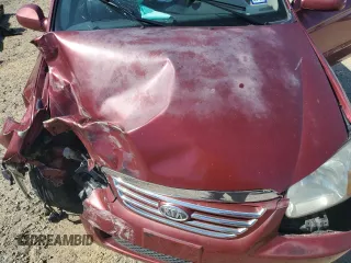 2007 Kia Spectra EX z VIN KNAFE121275436205, wystawiony jako Copart lot #57680055 z przebiegiem 141 670 mil mil oraz Szkoda całkowita • Salvage title. Historia ofert i sprzedaży dostępna na DreamBid. Obrazek 11.