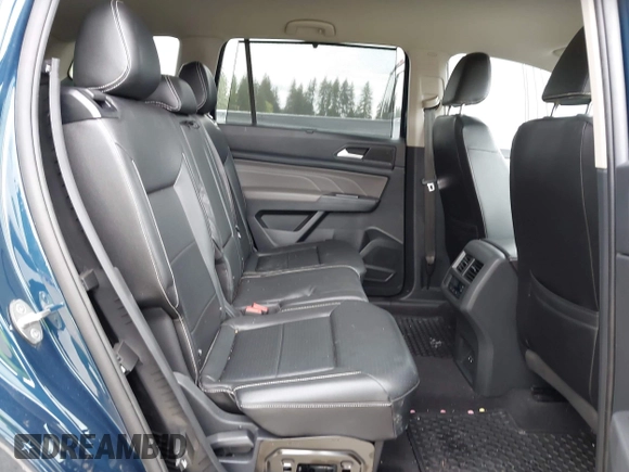 2021 Volkswagen Atlas SE z VIN 1V2WR2CA7MC568779, wystawiony jako IAAI lot #42132709 z przebiegiem 51 205 mil mil oraz . Historia ofert i sprzedaży dostępna na DreamBid. Obrazek 8.