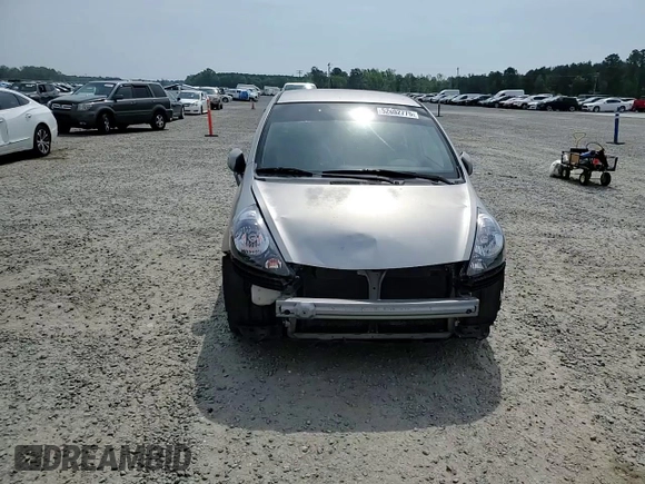2007 Honda Fit z VIN JHMGD38427S021652, wystawiony jako Copart lot #52692775 z przebiegiem 178 416 mil mil oraz Szkoda całkowita • Salvage title. Historia ofert i sprzedaży dostępna na DreamBid. Obrazek 11.