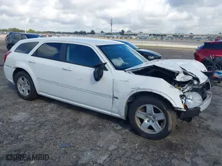 2006 Dodge Magnum with VIN 2D4FV47V06H446788, listed as a IAAI auction lot 41571984 with 244,231 mi miles. Bid and sale history available at carsss.com. Image 1.