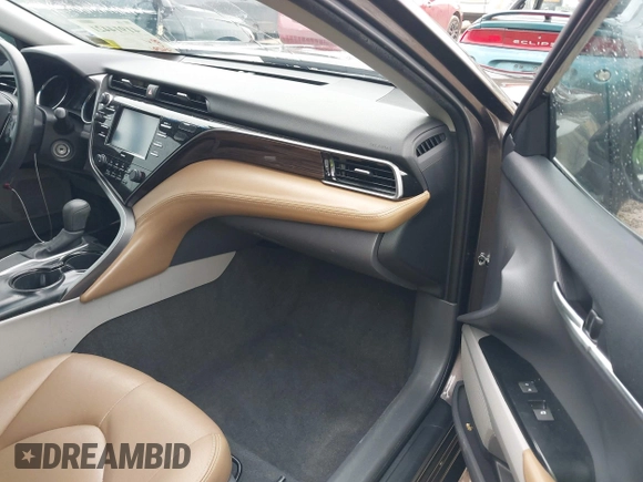 2020 Toyota Camry LE with VIN 4T1C11AK1LU320677, listed as a IAAI auction lot 41914421 with 94,291 mi miles. Bid and sale history available at carsss.com. Image 5.