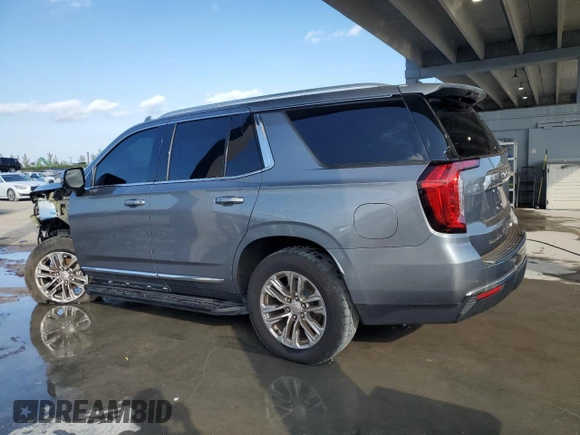 2021 GMC Yukon SLT with VIN 1GKS2BKD4MR123045, listed as a Copart auction lot 86637604 with 100,182 mi miles and Salvage Title. Bid and sale history available at carsss.com. Image 2.