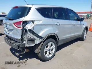 2016 Ford Escape SE with VIN 1FMCU9GX8GUC48620, listed as a IAAI auction lot 41970304 with 65,653 mi miles. Bid and sale history available at carsss.com. Image 4.