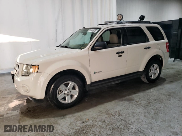 2011 Ford Escape Hybrid with VIN 1FMCU4K35BKC23461, listed as a Copart auction lot 73209354 with 3,888 mi miles and Clean title. Bid and sale history available at DreamBid. Image 1.