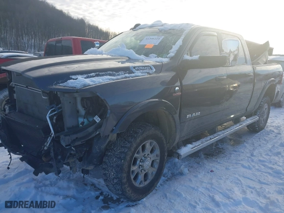 2022 Ram 2500 Laramie with VIN 3C6UR5FL9NG309997, listed as a IAAI auction lot 41346224 with 59,338 mi miles. Bid and sale history available at carsss.com. Image 2.