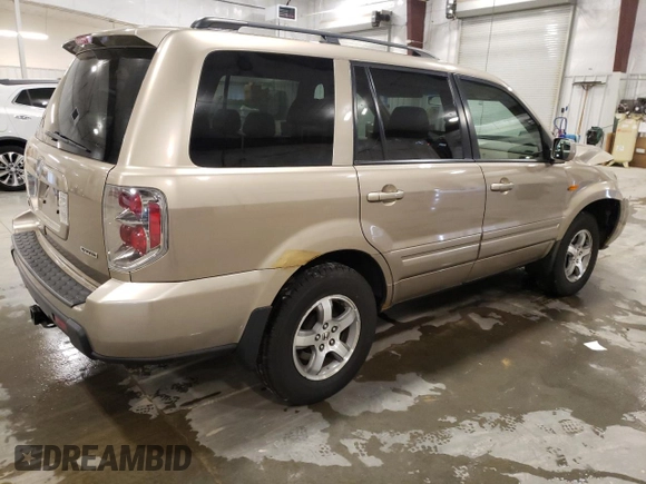 2006 Honda Pilot EX-L with VIN 2HKYF18506H563925, listed as a Copart auction lot 54539435 with 199,442 mi miles and Salvage Title. Bid and sale history available at DreamBid. Image 3.