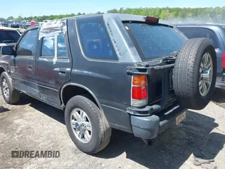 1996 Isuzu Rodeo z VIN 4S2CK58V1T4342739, wystawiony jako IAAI lot #42058798 z przebiegiem 268 502 mil mil oraz . Historia ofert i sprzedaży dostępna na DreamBid. Obrazek 3.