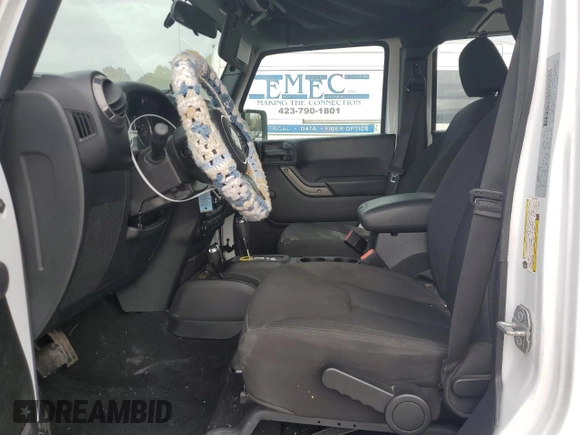 2018 Jeep Wrangler JK Unlimited Sport S with VIN 1C4BJWDGXJL898946, listed as a Copart auction lot 77688334 with 34,179 mi miles and Salvage Title. Bid and sale history available at carsss.com. Image 7.