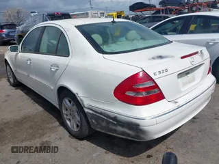 2003 Mercedes-Benz E-Class 3.2L with VIN WDBUF65J23A120318, listed as a IAAI auction lot 41927993 with 113,578 mi miles. Bid and sale history available at carsss.com. Image 3.