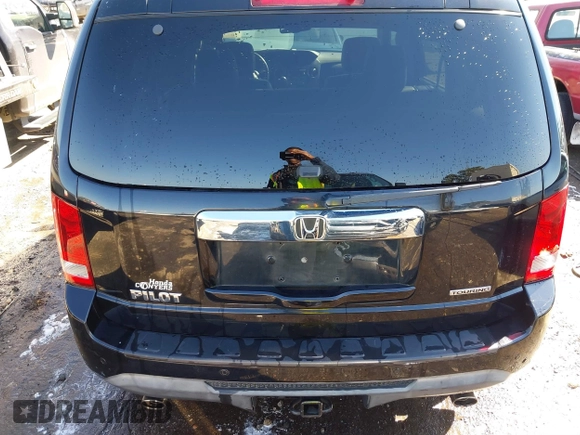 2015 Honda Pilot Touring with VIN 5FNYF3H97FB016390, listed as a IAAI auction lot 41753590 with 217,156 mi miles. Bid and sale history available at carsss.com. Image 16.
