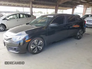 2018 Honda Civic EX-T with VIN JHMFC1F38JX028600, listed as a Copart auction lot 63126445 with 118,192 mi miles and Salvage title. Bid and sale history available at DreamBid. Image 1.