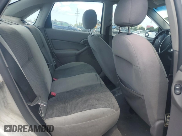 2003 Ford Focus SE with VIN 1FAFP34353W231334, listed as a Copart auction lot 63844205 with 86,601 mi miles and Salvage title. Bid and sale history available at DreamBid. Image 10.
