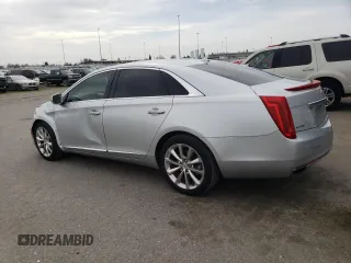 2014 Cadillac XTS Luxury with VIN 2G61M5S31E9217117, listed as a Copart auction lot 49659075 with 104,988 mi miles and Salvage Title. Bid and sale history available at DreamBid. Image 2.