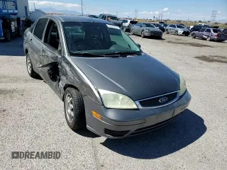 2007 Ford Focus S z VIN 1FAHP34N77W192231, wystawiony jako Copart lot #59020505 z przebiegiem 99 284 mil mil oraz Szkoda całkowita • Salvage title. Historia ofert i sprzedaży dostępna na DreamBid. Obrazek 13.
