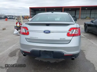 2012 Ford Taurus SHO z VIN 1FAHP2KT6CG142954, wystawiony jako IAAI lot #41526760 z przebiegiem 187 887 mil mil oraz . Historia ofert i sprzedaży dostępna na DreamBid. Obrazek 16.