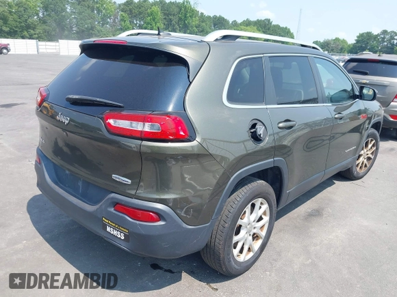 2015 Jeep Cherokee Latitude z VIN 1C4PJMCS9FW551694, wystawiony jako IAAI lot #42424992 z przebiegiem 125 852 mil mil oraz . Historia ofert i sprzedaży dostępna na DreamBid. Obrazek 4.