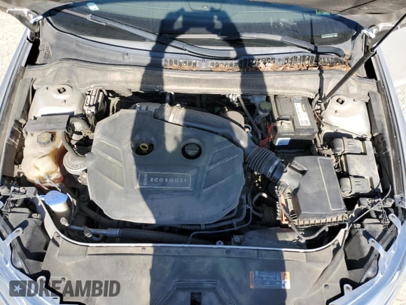 2015 Lincoln MKZ z VIN 3LN6L2G95FR603693, wystawiony jako Copart lot #53362845 z przebiegiem 171 107 mil mil oraz Szkoda całkowita • Salvage title. Historia ofert i sprzedaży dostępna na DreamBid. Obrazek 11.