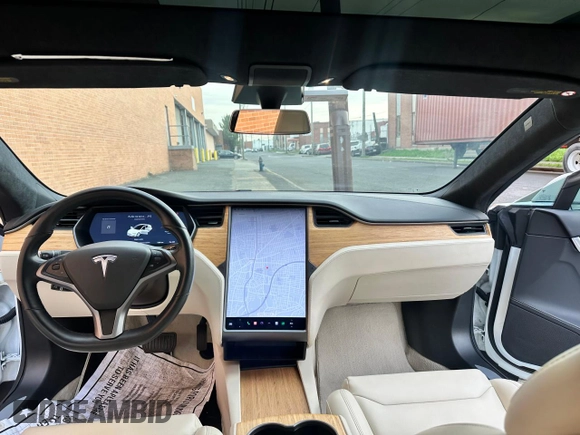 2019 Tesla Model S 75D with VIN 5YJSA1E28KF333962, listed as a Copart auction lot 54815975 with 21,203 mi miles and Salvage title. Bid and sale history available at DreamBid. Image 9.