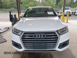 2017 Audi Q7 Premium with VIN WA1AAAF74HD006104, listed as a IAAI auction lot 42554741 with 95,276 mi miles and . Bid and sale history available at DreamBid. Image 13.