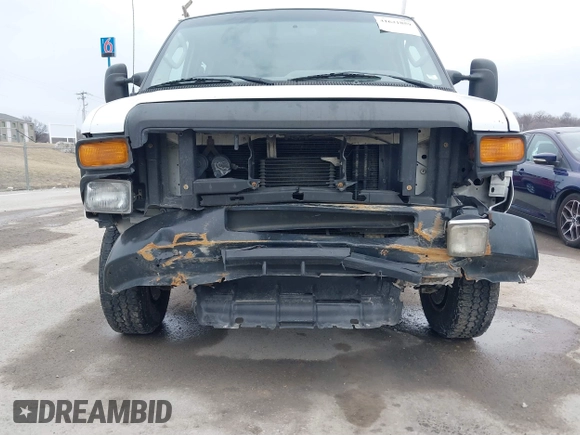 2009 Ford Econoline Cargo Commercial with VIN 1FTNE14W49DA93428, listed as a IAAI auction lot 41641859 with 220,630 mi miles and . Bid and sale history available at DreamBid. Image 6.
