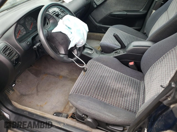 1998 Subaru Legacy Outback with VIN 4S3BG6850W7601142, listed as a Copart auction lot 57319505 with 227,489 mi miles and Salvage title. Bid and sale history available at DreamBid. Image 7.