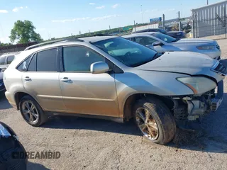 2006 Lexus RX 400h with VIN JTJGW31U860003878, listed as a IAAI auction lot 42226980 with 197,783 mi miles and . Bid and sale history available at DreamBid. Image 13.