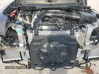 2024 Land Rover Defender S with VIN SALEJ7EU2R2272955, listed as a Copart auction lot 66796994 with 9,079 mi miles and Salvage title. Bid and sale history available at DreamBid. Image 12.