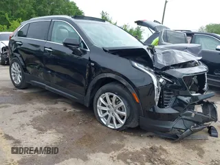 2021 Cadillac XT4 FWD Luxury with VIN 1GYAZAR44MF004295, listed as a IAAI auction lot 42196752 with 69,311 mi miles and . Bid and sale history available at DreamBid. Image 1.