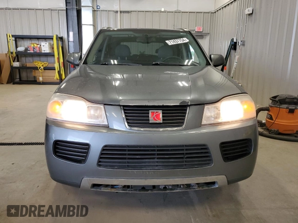 2007 Saturn VUE I4 Hybrid z VIN 5GZCZ33Z67S867558, wystawiony jako Copart lot #71437754 z przebiegiem 119 160 mil mil oraz Czysty tytuł • Clean title. Historia ofert i sprzedaży dostępna na DreamBid. Obrazek 5.
