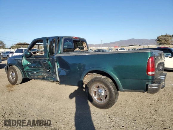 2000 Ford F-150 XL with VIN 1FTRX17W4YNB17453, listed as a Copart auction lot 52051215 with Not provided miles and Salvage title. Bid and sale history available at DreamBid. Image 2.