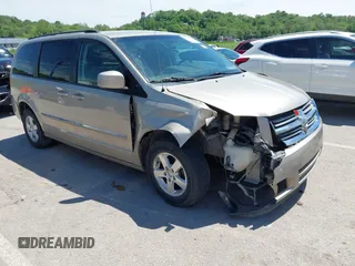 2009 Dodge Grand Caravan SXT z VIN 2D8HN54119R615570, wystawiony jako IAAI lot #42194422 z przebiegiem 189 451 mil mil oraz . Historia ofert i sprzedaży dostępna na DreamBid. Obrazek 1.