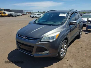 2013 Ford Escape SEL with VIN 1FMCU9H92DUB31689, listed as a IAAI auction lot 42022387 with 74,343 mi miles. Bid and sale history available at carsss.com. Image 6.