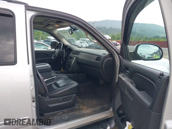 2011 Chevrolet Suburban LT with VIN 1GNSKJE32BR330742, listed as a IAAI auction lot 42435335 with 191,663 mi miles and . Bid and sale history available at DreamBid. Image 5.