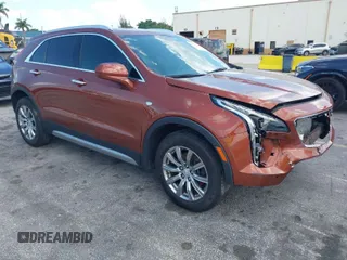 2019 Cadillac XT4 FWD Premium Luxury with VIN 1GYFZCR41KF183507, listed as a IAAI auction lot 41987176 with 64,803 mi miles. Bid and sale history available at carsss.com. Image 1.
