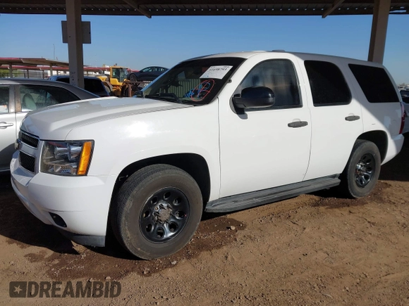 2007 Chevrolet Tahoe Police z VIN 1GNEC03097R414206, wystawiony jako IAAI lot #41698793 z przebiegiem 188 773 mil mil oraz . Historia ofert i sprzedaży dostępna na DreamBid. Obrazek 2.