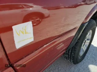 2001 Isuzu Rodeo S z VIN 4S2CK58W414317422, wystawiony jako Copart lot #75123154 z przebiegiem Nie podano mil oraz Szkody całkowita. Historia ofert i sprzedaży dostępna na DreamBid. Obrazek 13.
