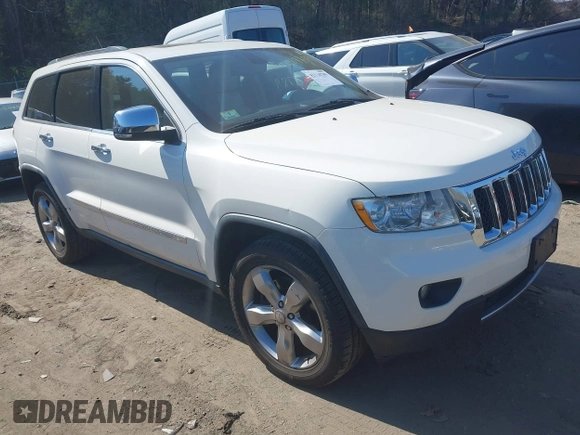 2011 Jeep Grand Cherokee Overland Summit with VIN 1J4RR6GT9BC546825, listed as a IAAI auction lot 42118789 with 123,449 mi miles. Bid and sale history available at carsss.com. Image 1.