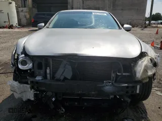 2011 Infiniti G25 x with VIN JN1DV6AR0BM450863, listed as a Copart auction lot 65278084 with 104,649 mi miles and Salvage Title. Bid and sale history available at carsss.com. Image 5.
